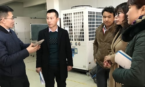 Experts visiting SCICOOLING factory and inspecting environmental testing equipment