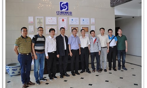 Government officials visiting SCICOOLING factory for inspection and discussion