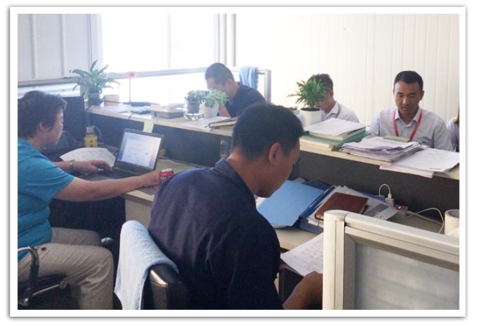 SCICOOLING quality team reviewing documents during an internal audit in August 2017