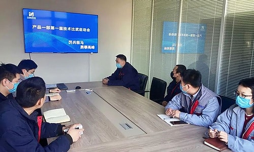 SCICOOLING engineering team discussing product development and technical review