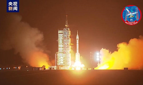 Shenzhou 18 launch vehicle lifting off at night