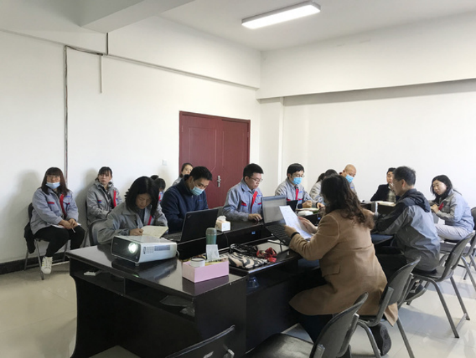 SCICOOLING expert audit team conducting a GJB military quality management system certification review meeting.