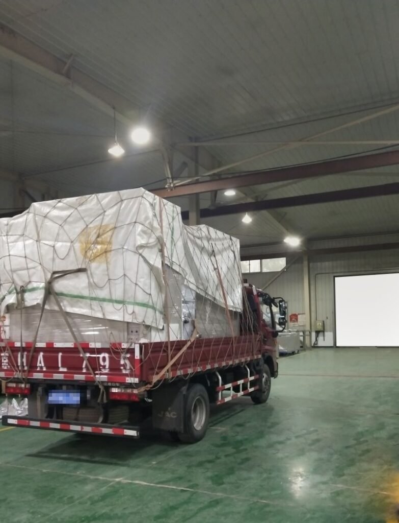 SCICOOLING environmental test equipment loaded on truck for transportation to customer site
