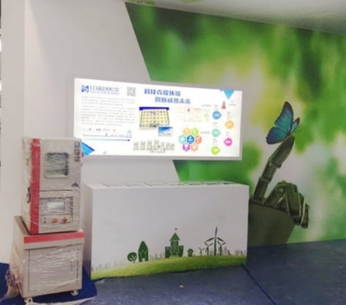 SCICOOLING exhibition booth displaying environmental test equipment at Beijing High-Tech Expo
