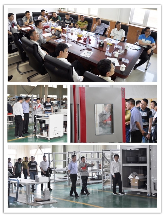 Visitors inspecting SCICOOLING environmental test chambers and production workshop