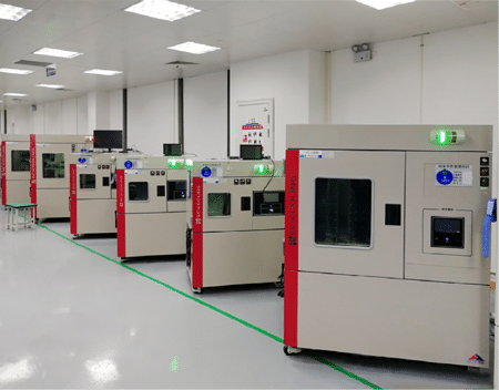 Rows of SCI temperature chambers in a semiconductor reliability laboratory