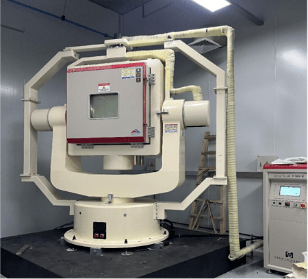 Rotary vibration table integrated with a temperature chamber