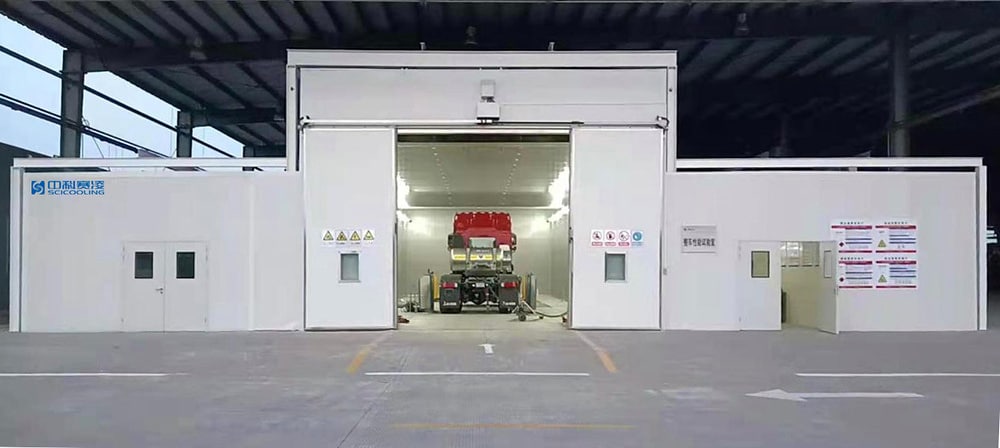 Walk-in environmental chamber configured for a complete vehicle
