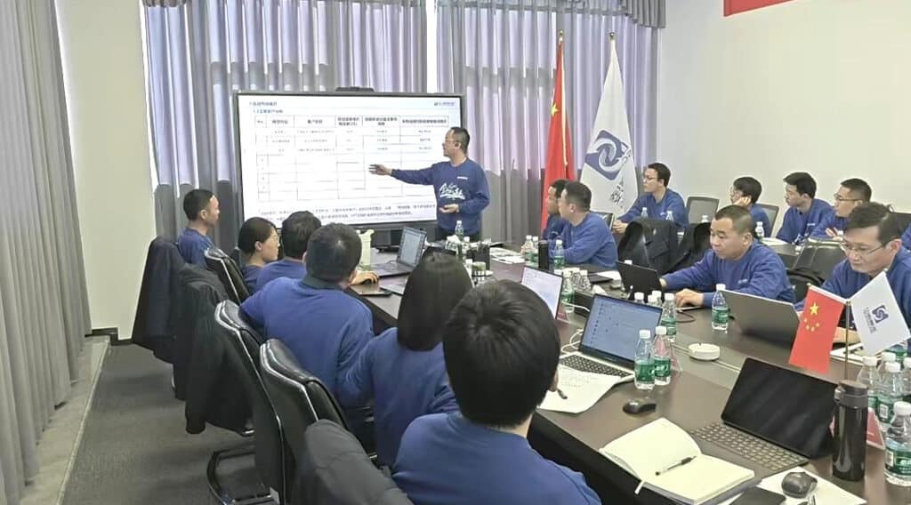 Presenter speaking to the SCICOOLING sales team