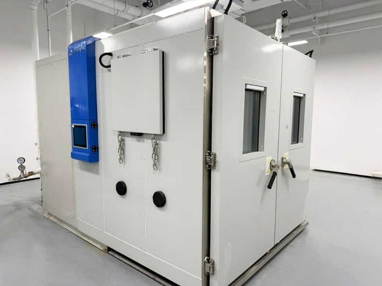Large walk-in chamber with external conditioning unit for battery testing